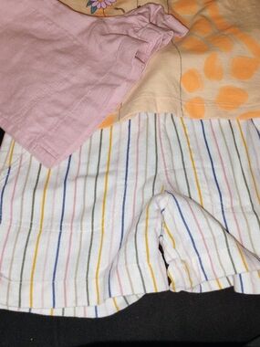 Girls Pastel Striped and Pink shorts.